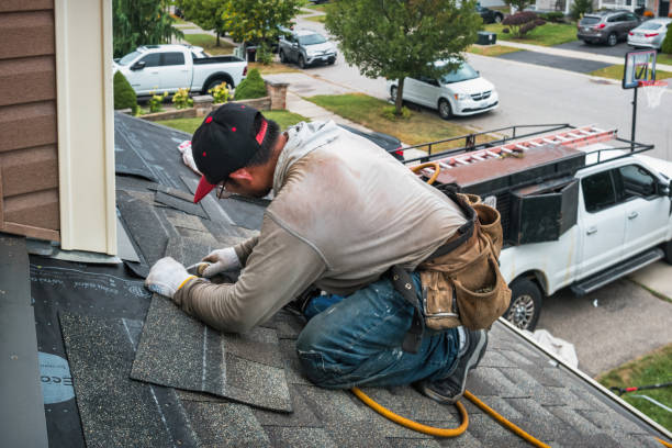 Professional Roof Repair technician working in Smithville, NJ